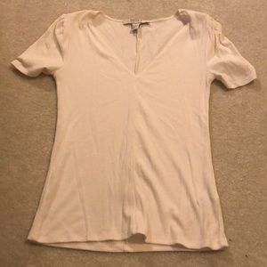 White v neck shirt with shoulder pads